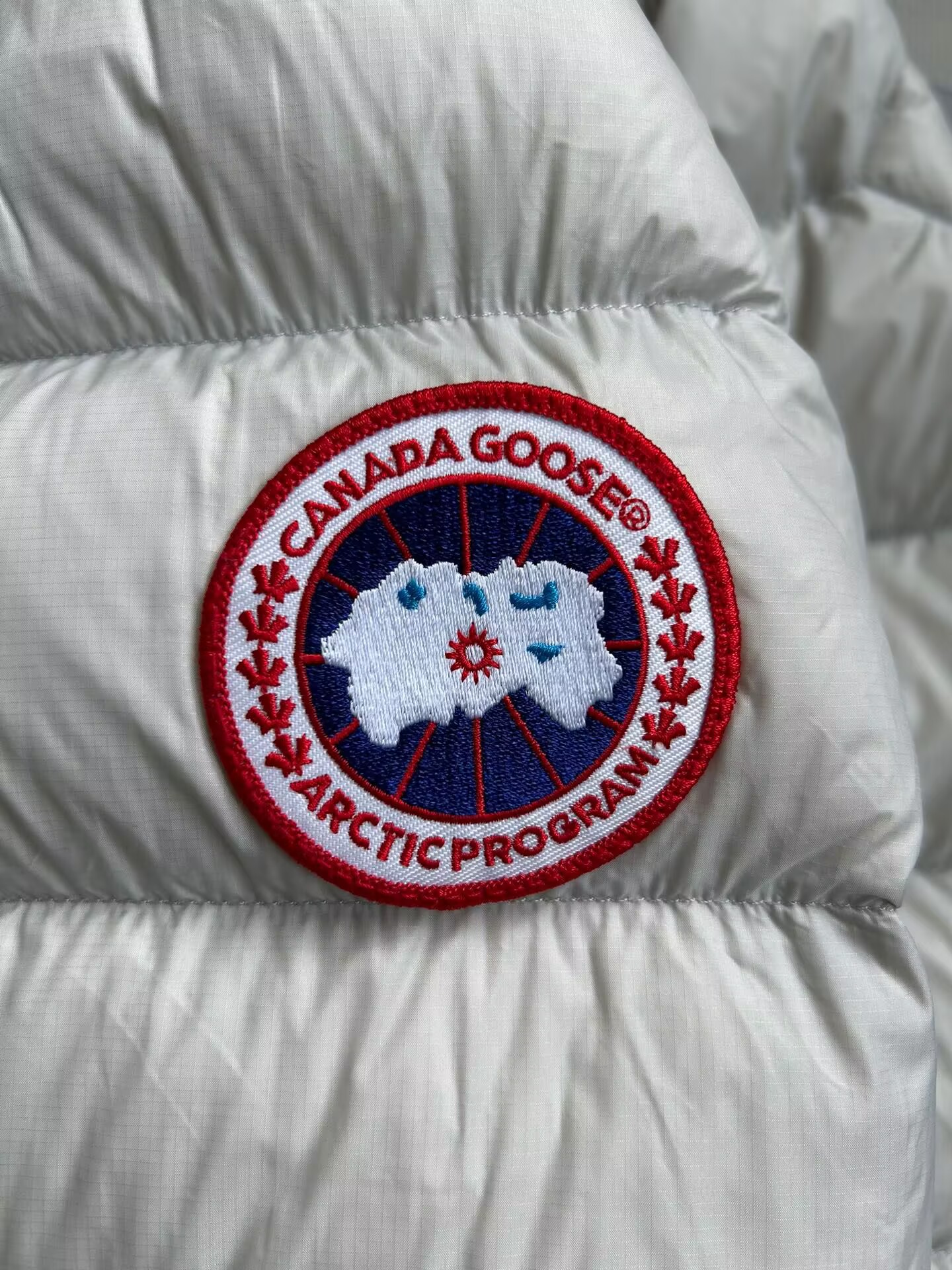 Can*a Go*e coat-257