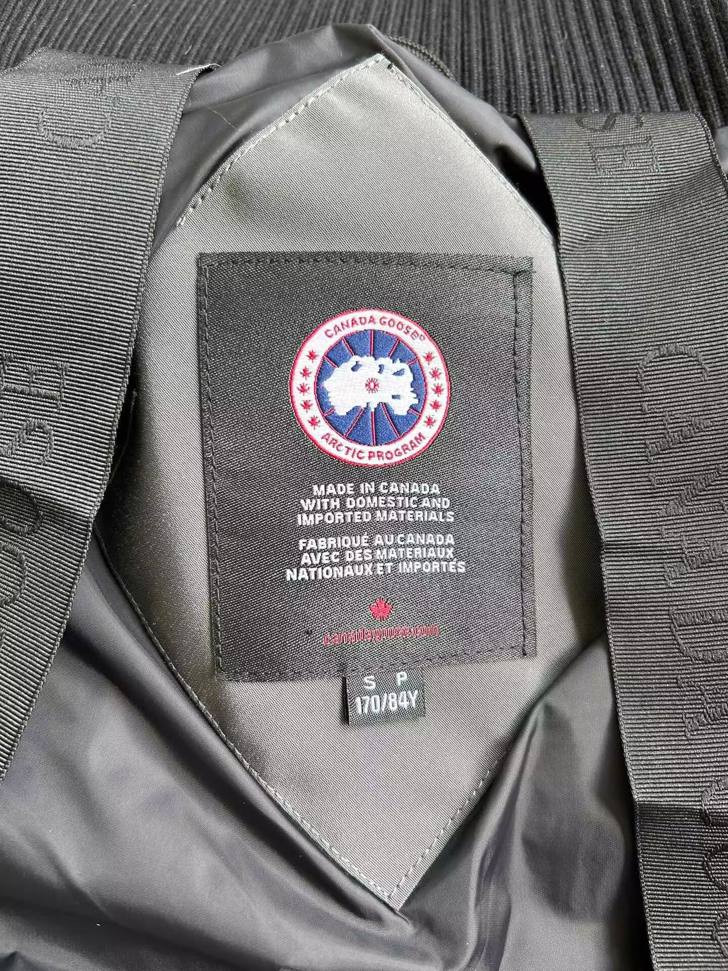 Can*a Go*e coat-254