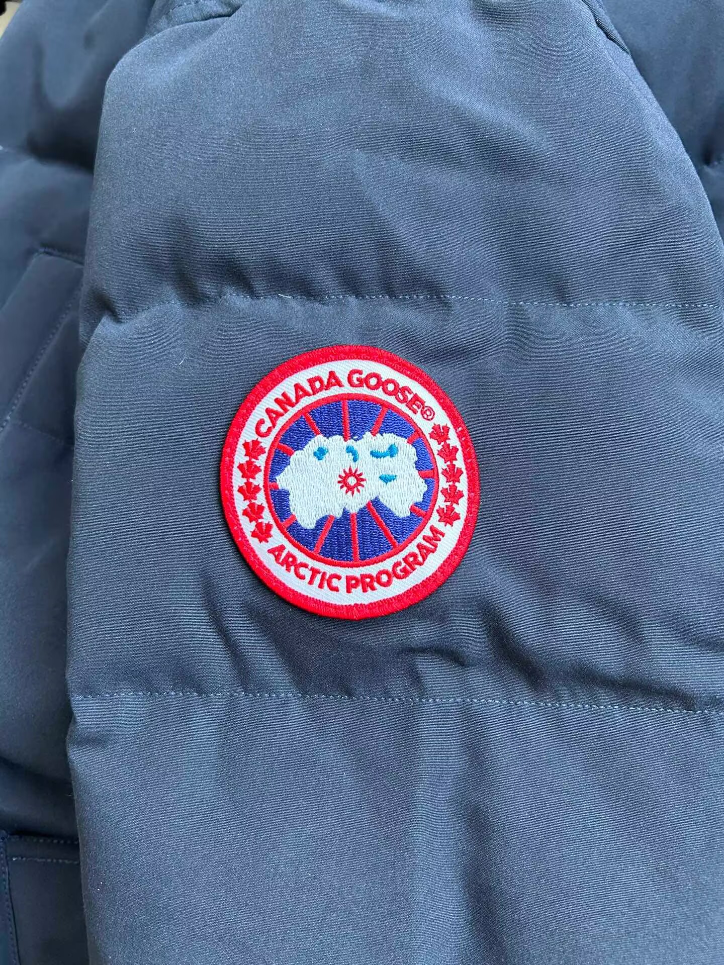 Can*a Go*e coat-381