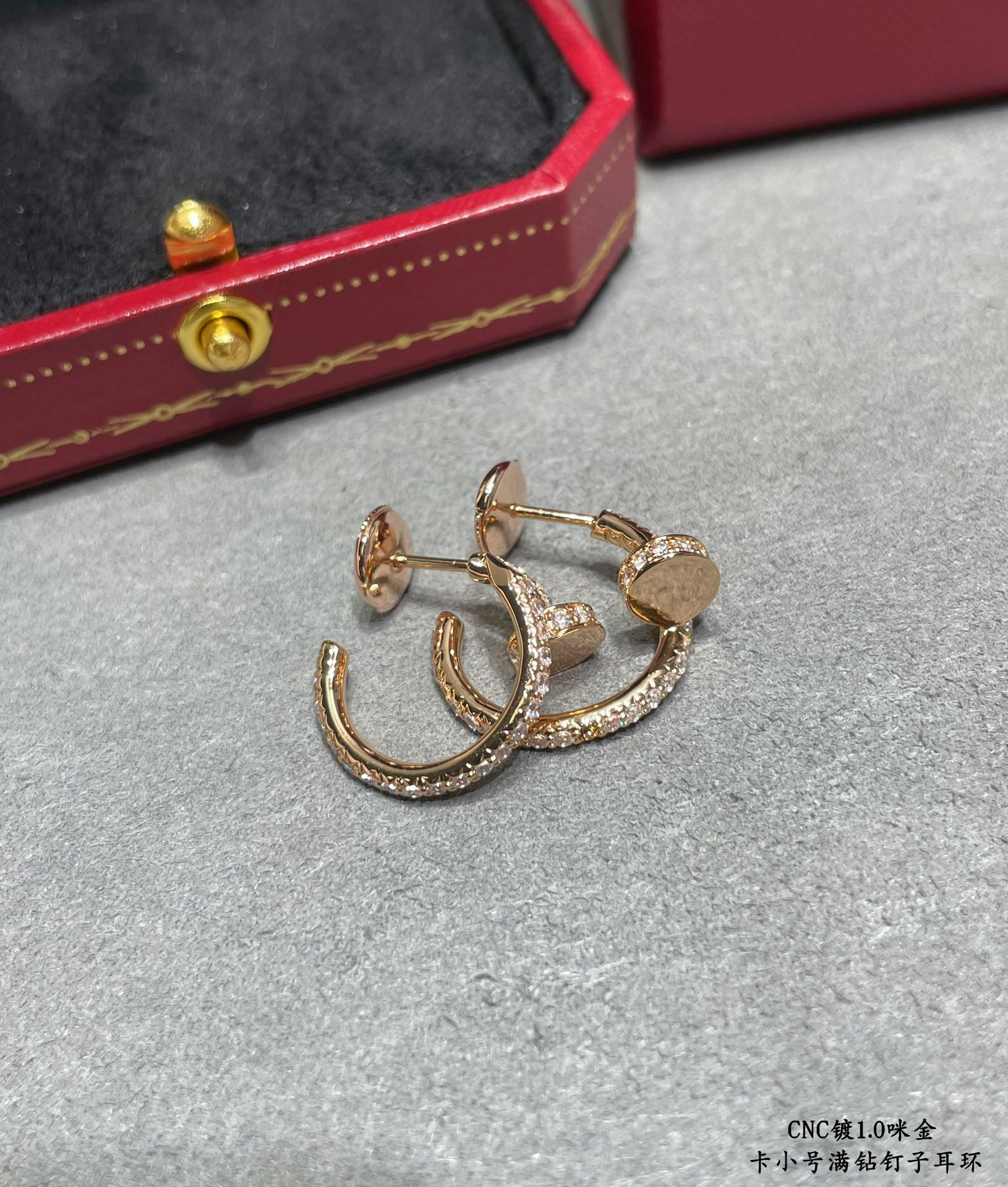 Ca*t1er Fully D1am0nd-encrusted small nail Earrings