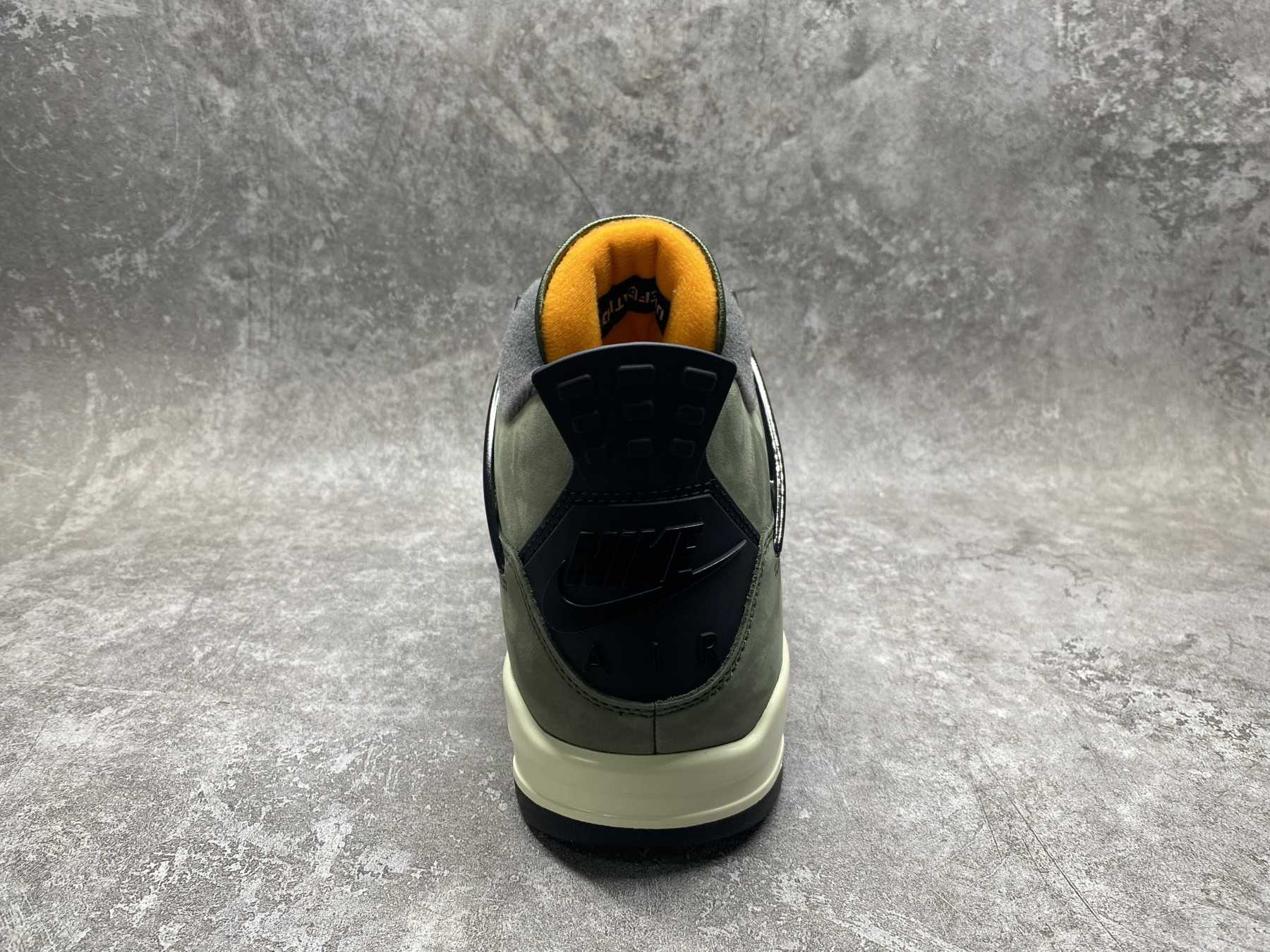 UA Jordan 4 Retro