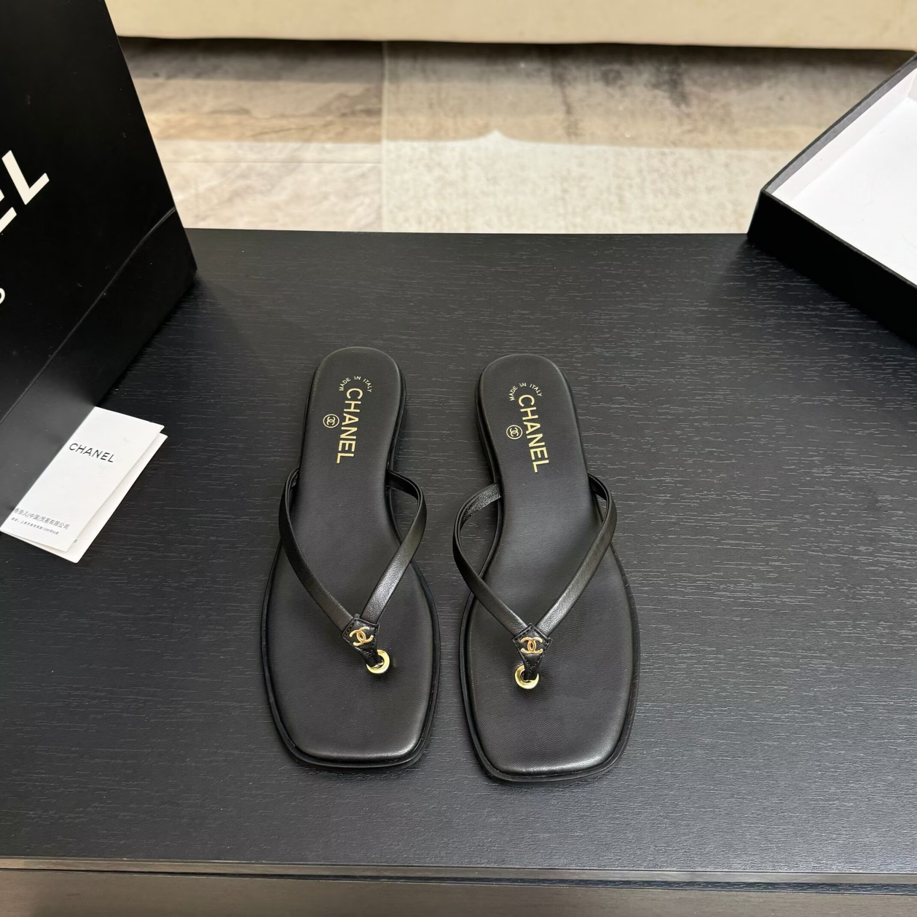 UA Ch**el Times Square Thong Sandals