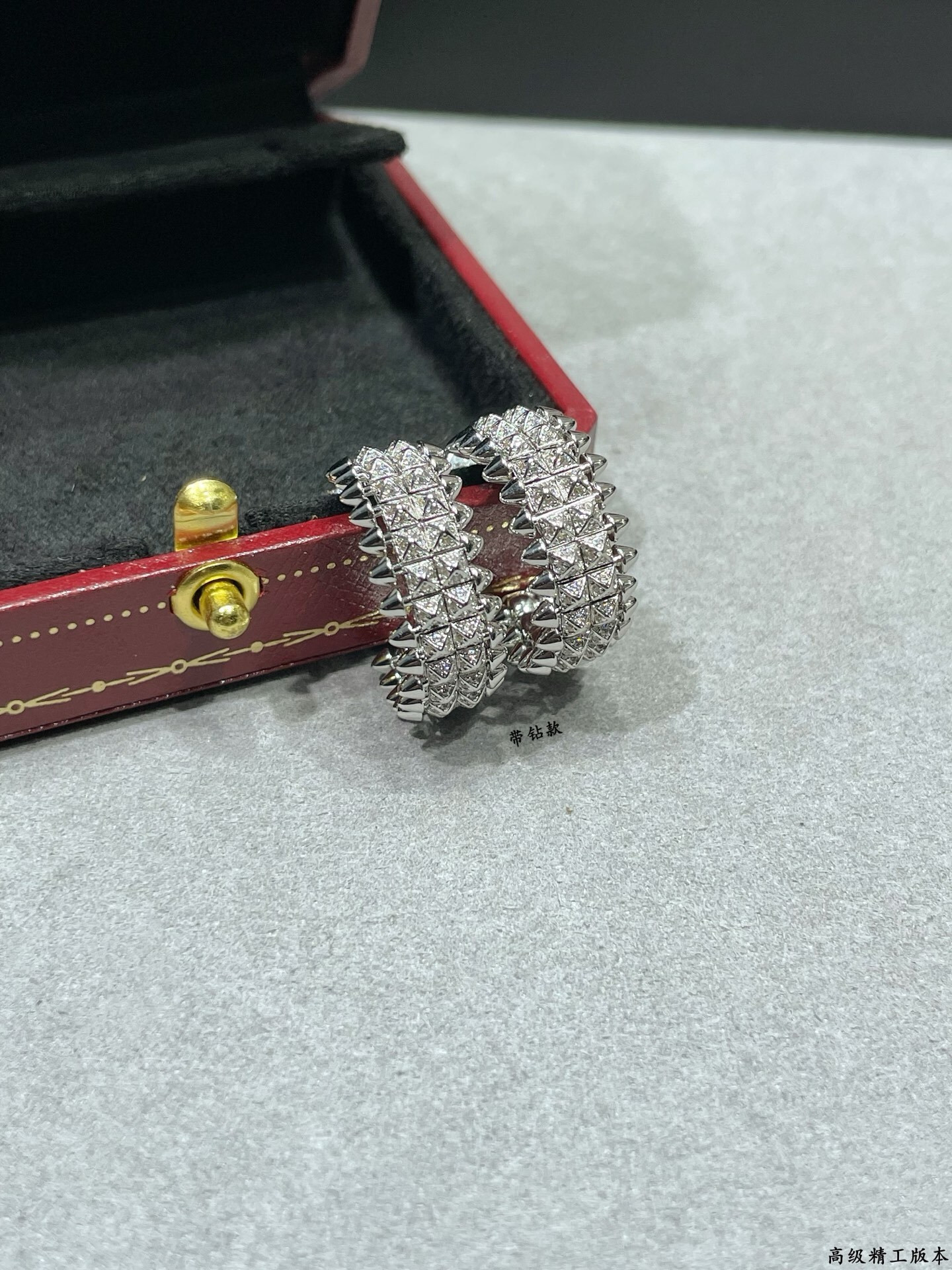 Ca*t1er Double-row Bullet Earrings with D1am0nds