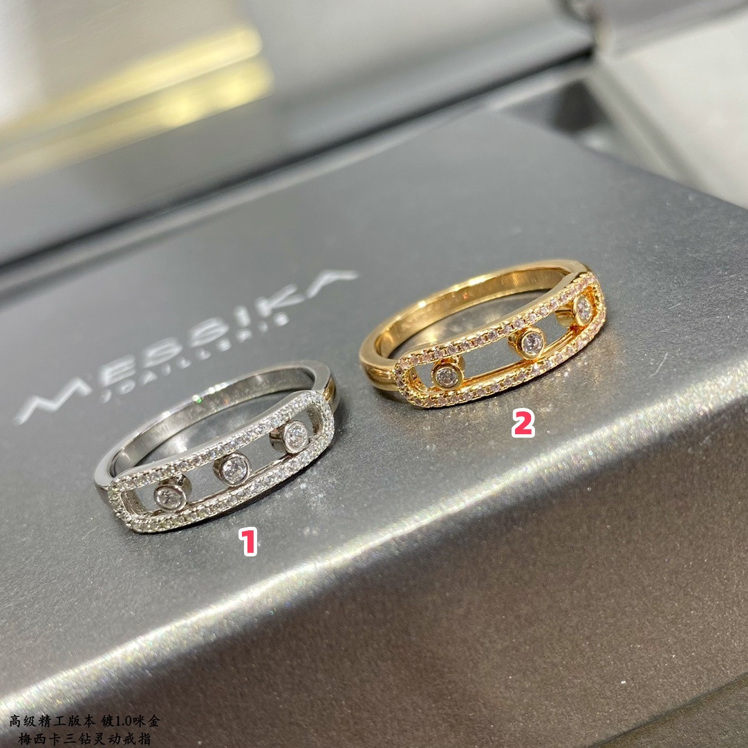 Mes1kaa three d1am0nd moving ring