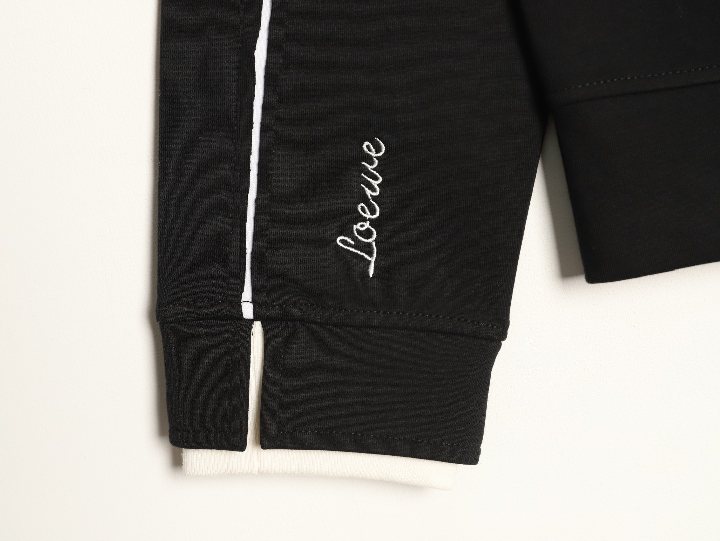 L0ew* Hoodies