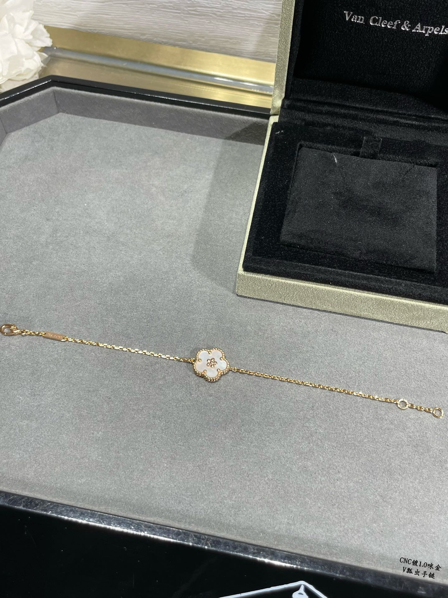 V*n Cl**f & Arpels plum blossom bracelet