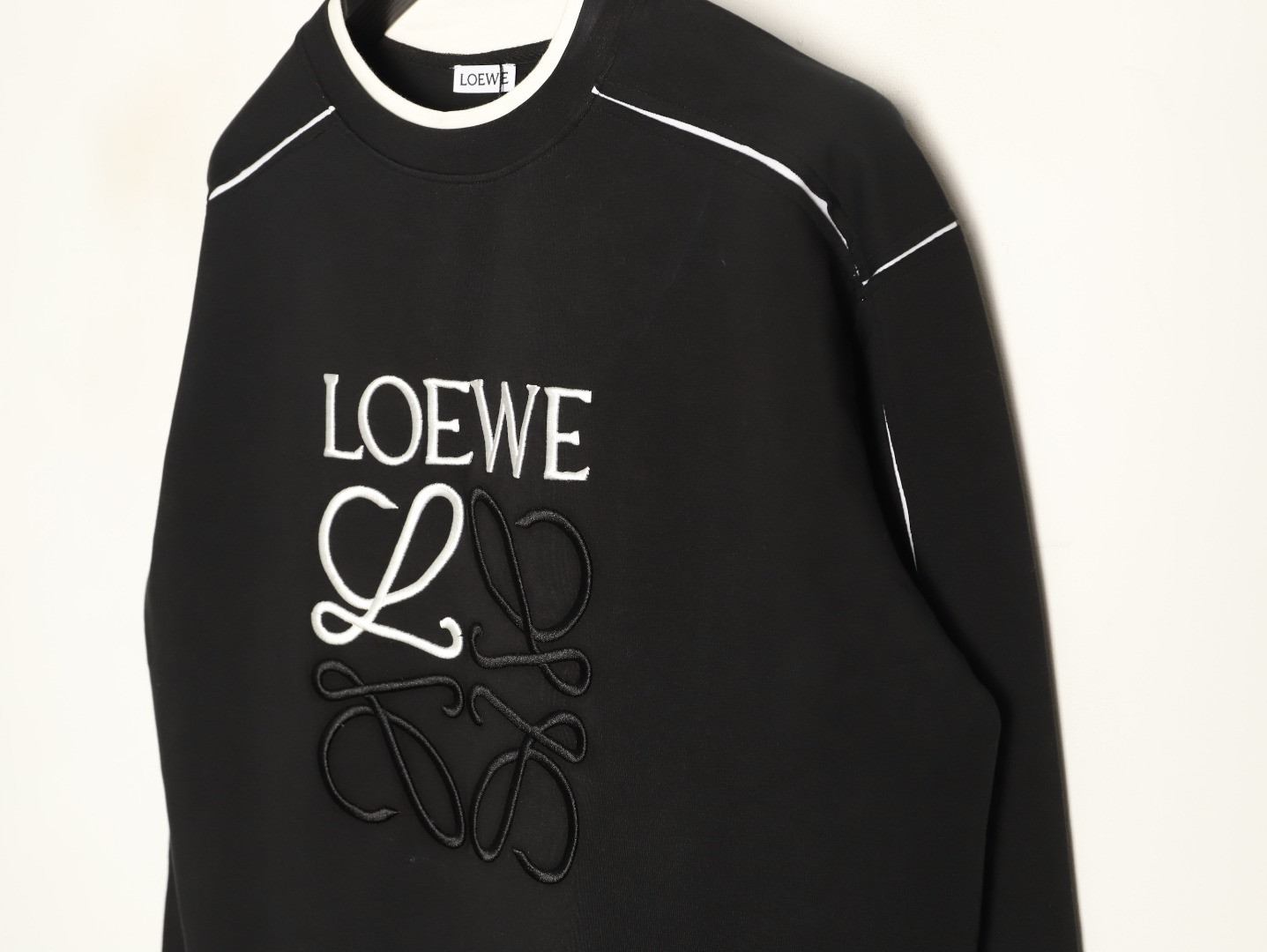 L0ew* Hoodies