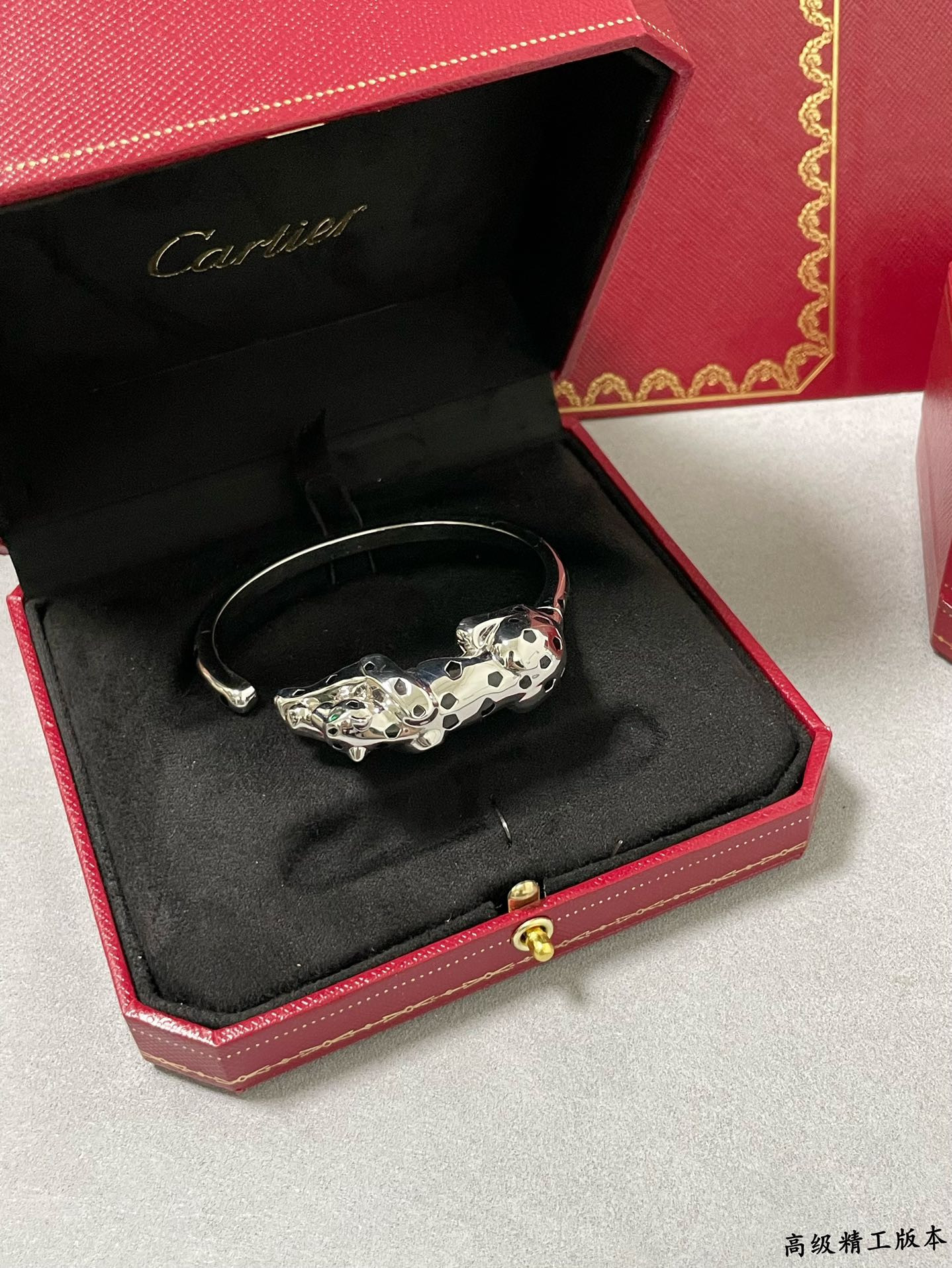 Ca*t1er Light Gold Spotted Leopard Bracelet