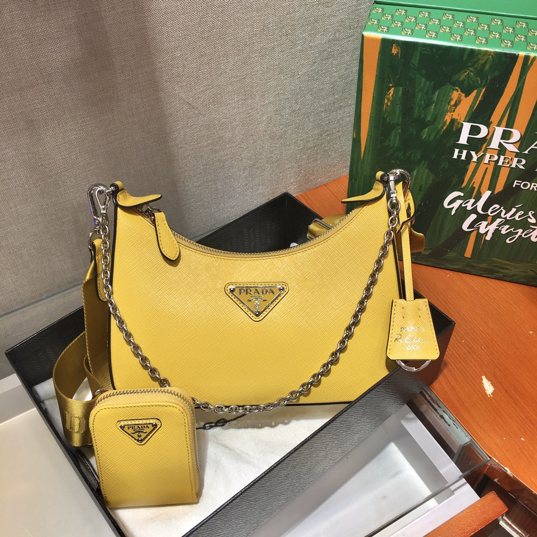 Pra*a Re-Edition 2005 Saffiano leather bag dark yellow