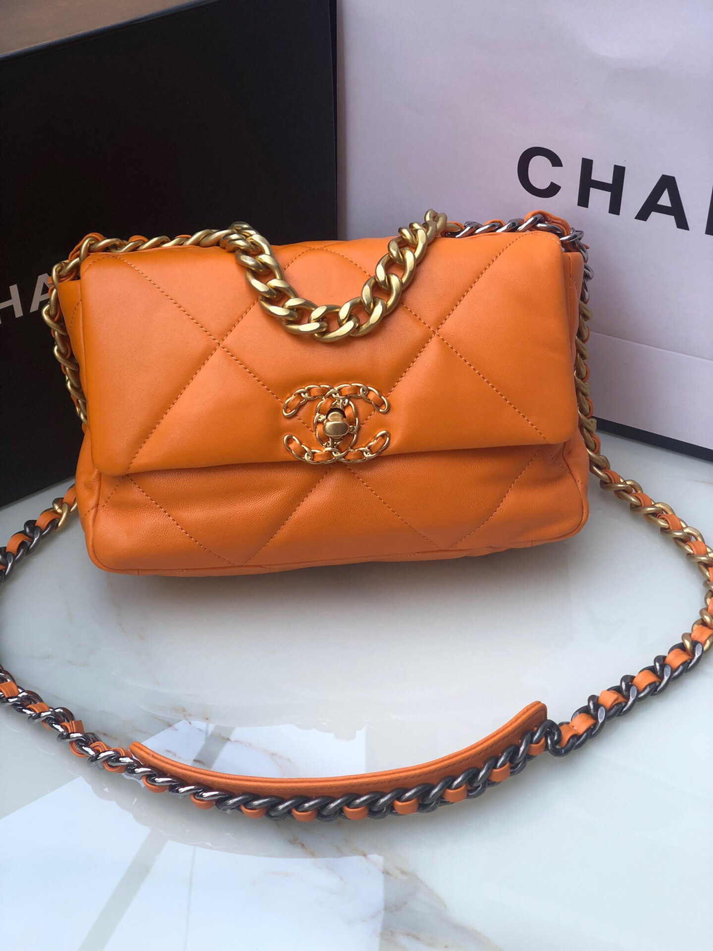 Ch**el 19 HANDBAG Shiny Leather, Gold-Tone, Silver-Tone & Ruthenium-Finish Metal Orange 6.2 × 10.1 × 3.5 in