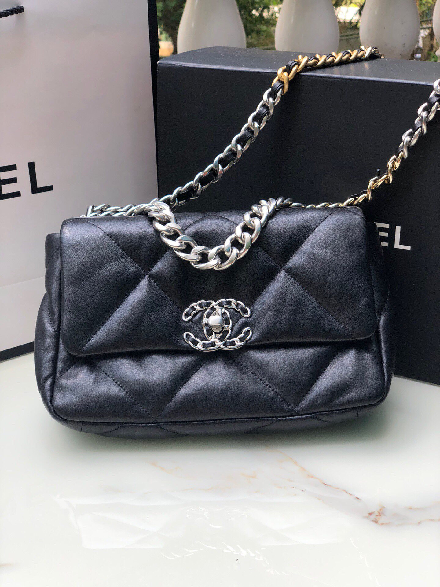 Ch**el 19 HANDBAG Shiny Leather, Gold-Tone, Silver-Tone & Ruthenium-Finish Metal Black 6.2 × 10.1 × 3.5 in