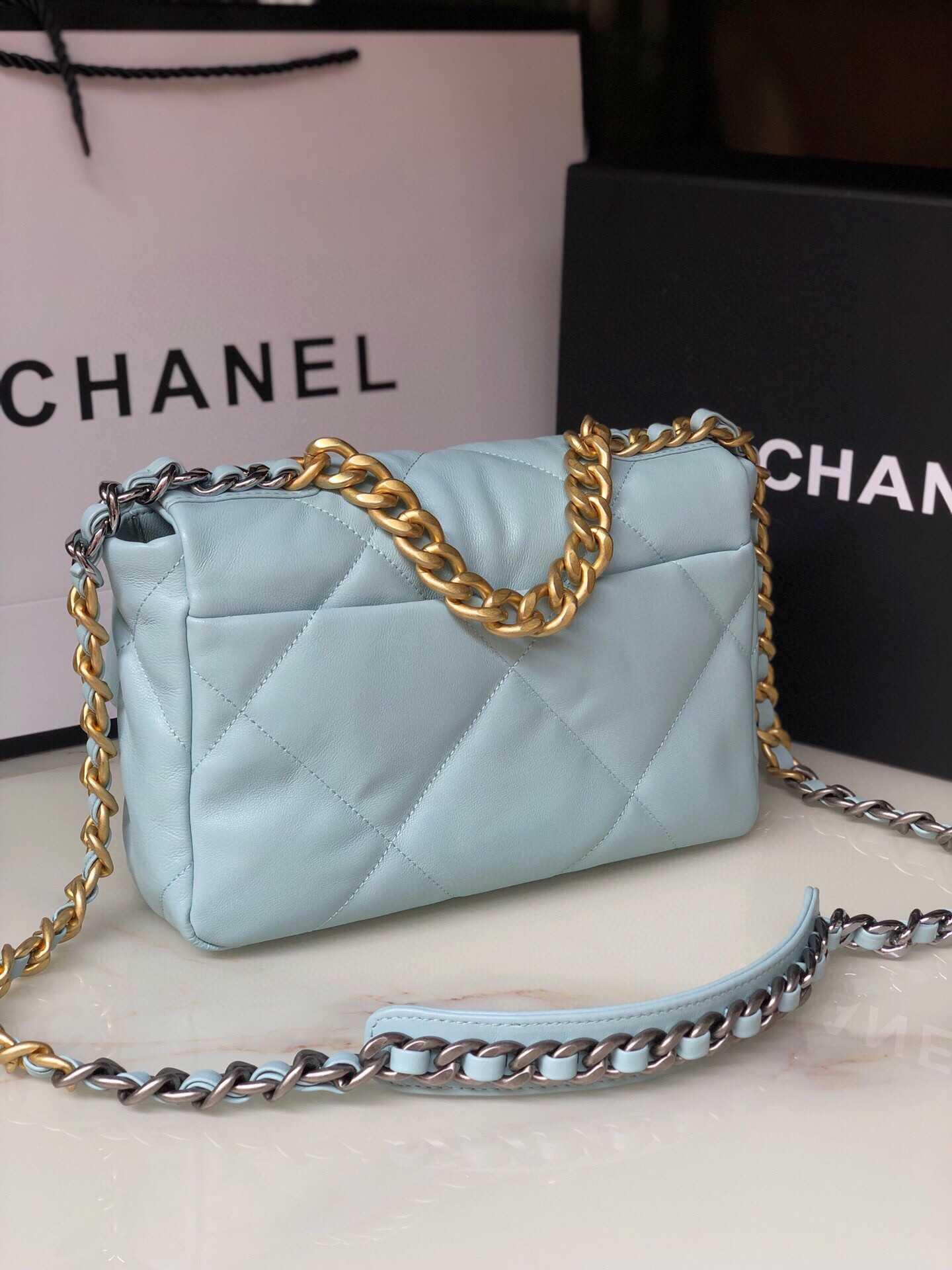 Ch**el 19 HANDBAG Shiny Leather, Gold-Tone, Silver-Tone & Ruthenium-Finish Metal Light Blue 6.2 × 10.1 × 3.5 in