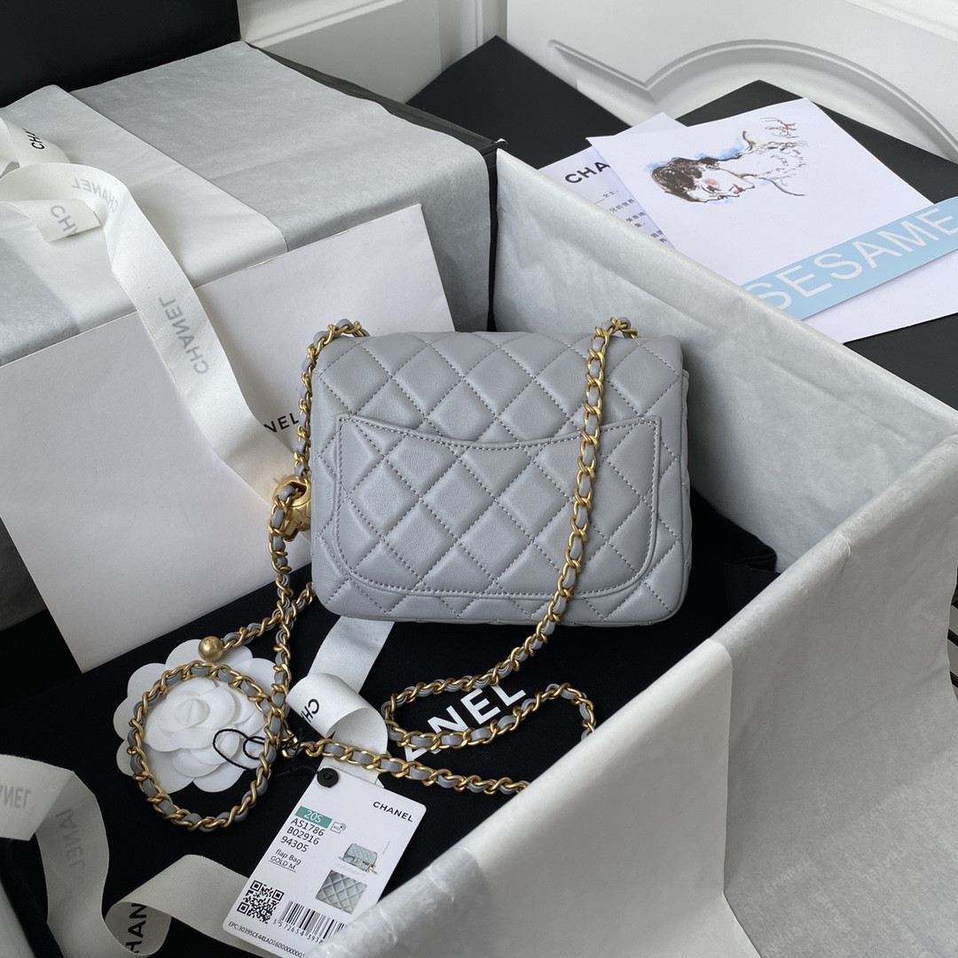 Ch**el MINI FLAP BAG SHINY CALFSKIN & Gold-Tone METAL LIGHT BLUE 5.3 × 6.6 × 3.1 in