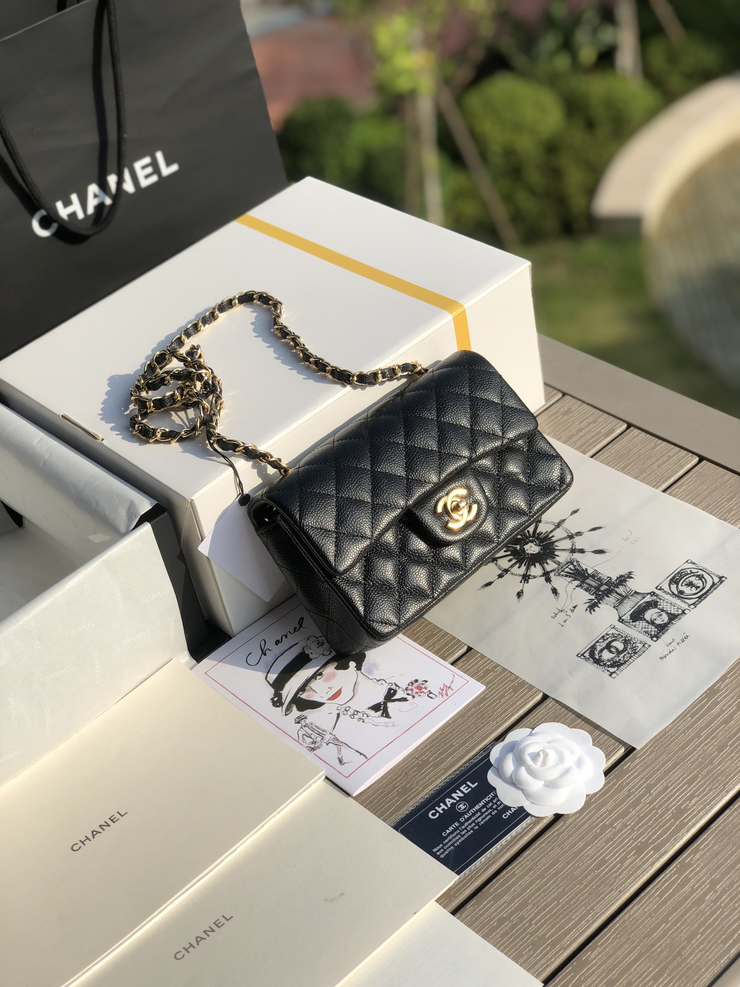 Ch**el MINI FLAP BAG BLACK WITH GOLD-TONE MENTAL 4.7 × 7.8 × 2.3 in