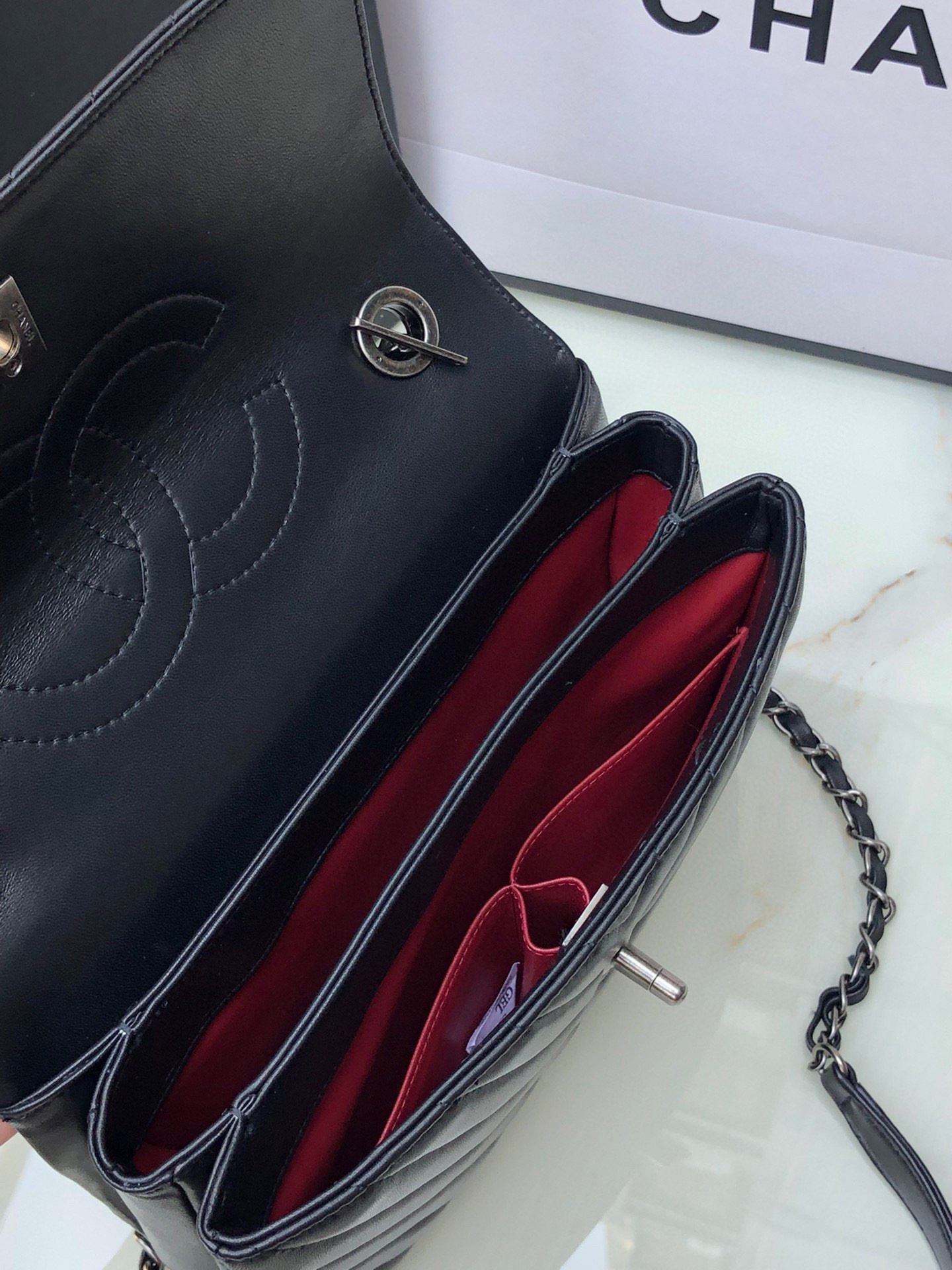 Ch**el FLAP BAG WITH TOP HANDLE 6.6 × 9.8 × 4.7 in