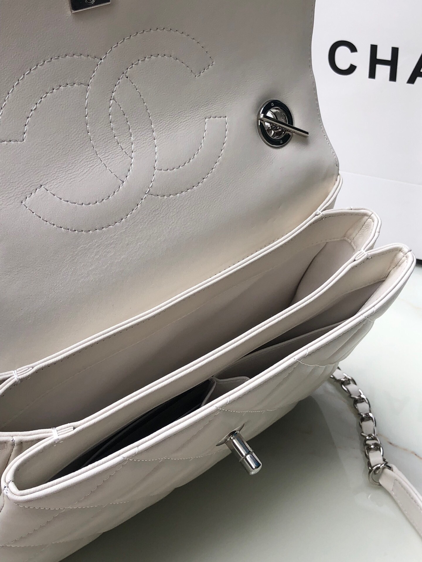 Ch**el FLAP BAG WITH TOP HANDLE 6.6 × 9.8 × 4.7 in