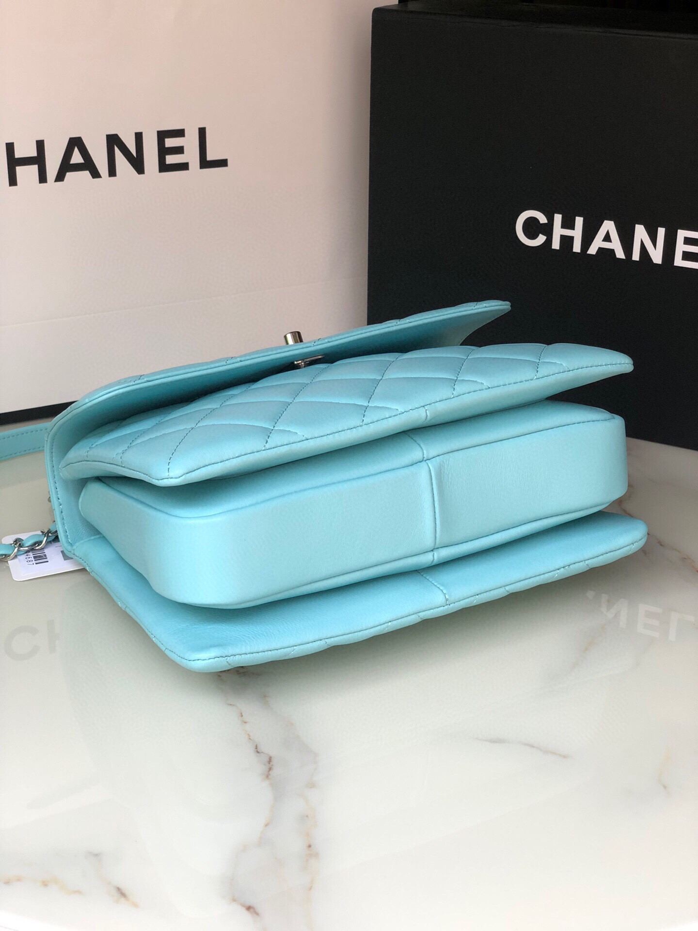 Ch**el FLAP BAG WITH TOP HANDLE 6.6 × 9.8 × 4.7 in