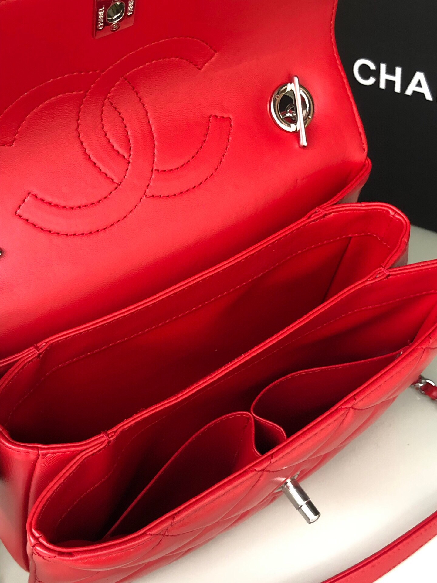 Ch**el FLAP BAG WITH TOP HANDLE 6.6 × 9.8 × 4.7 in