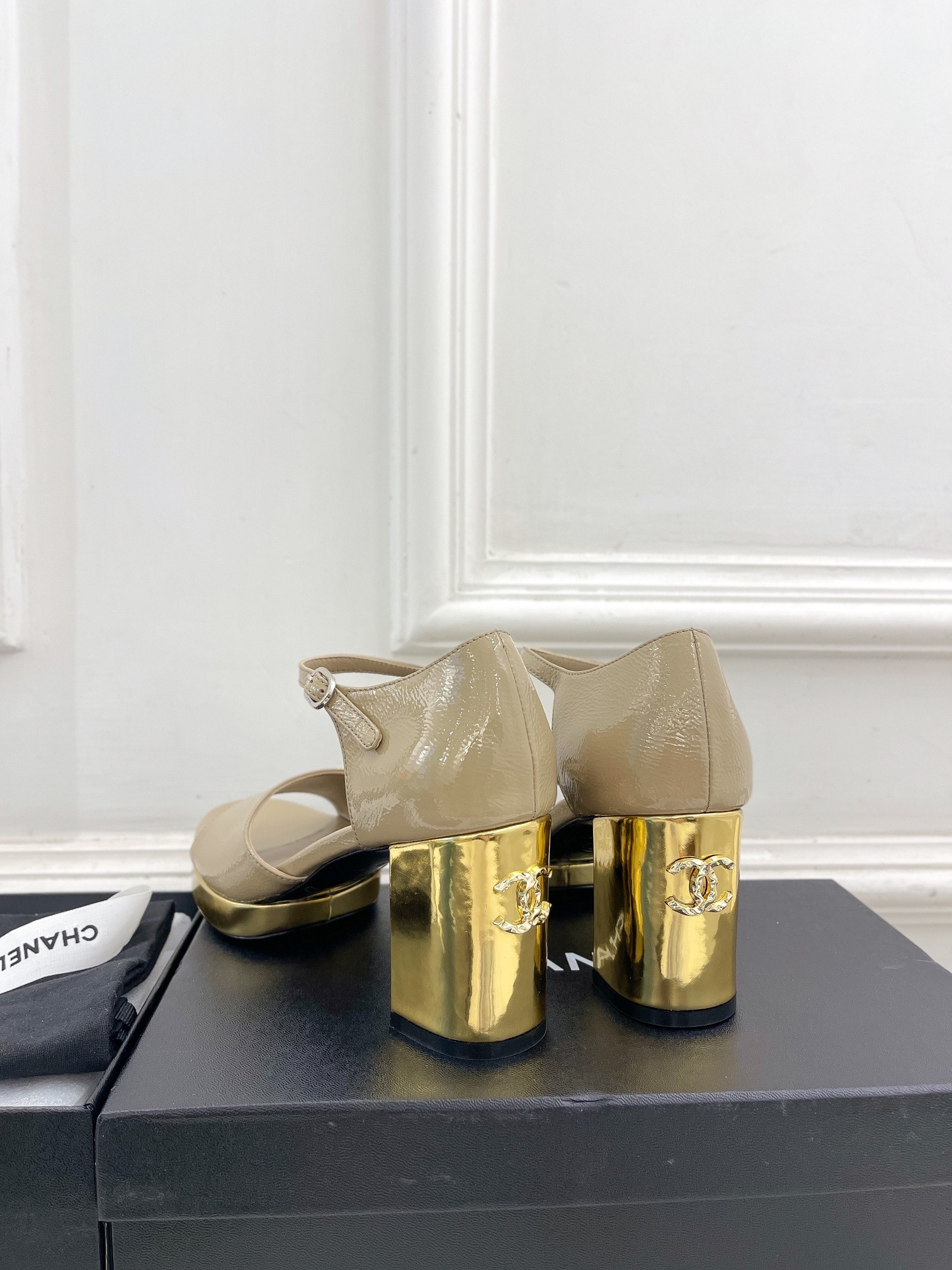UA Ch**el HEELED SANDALS