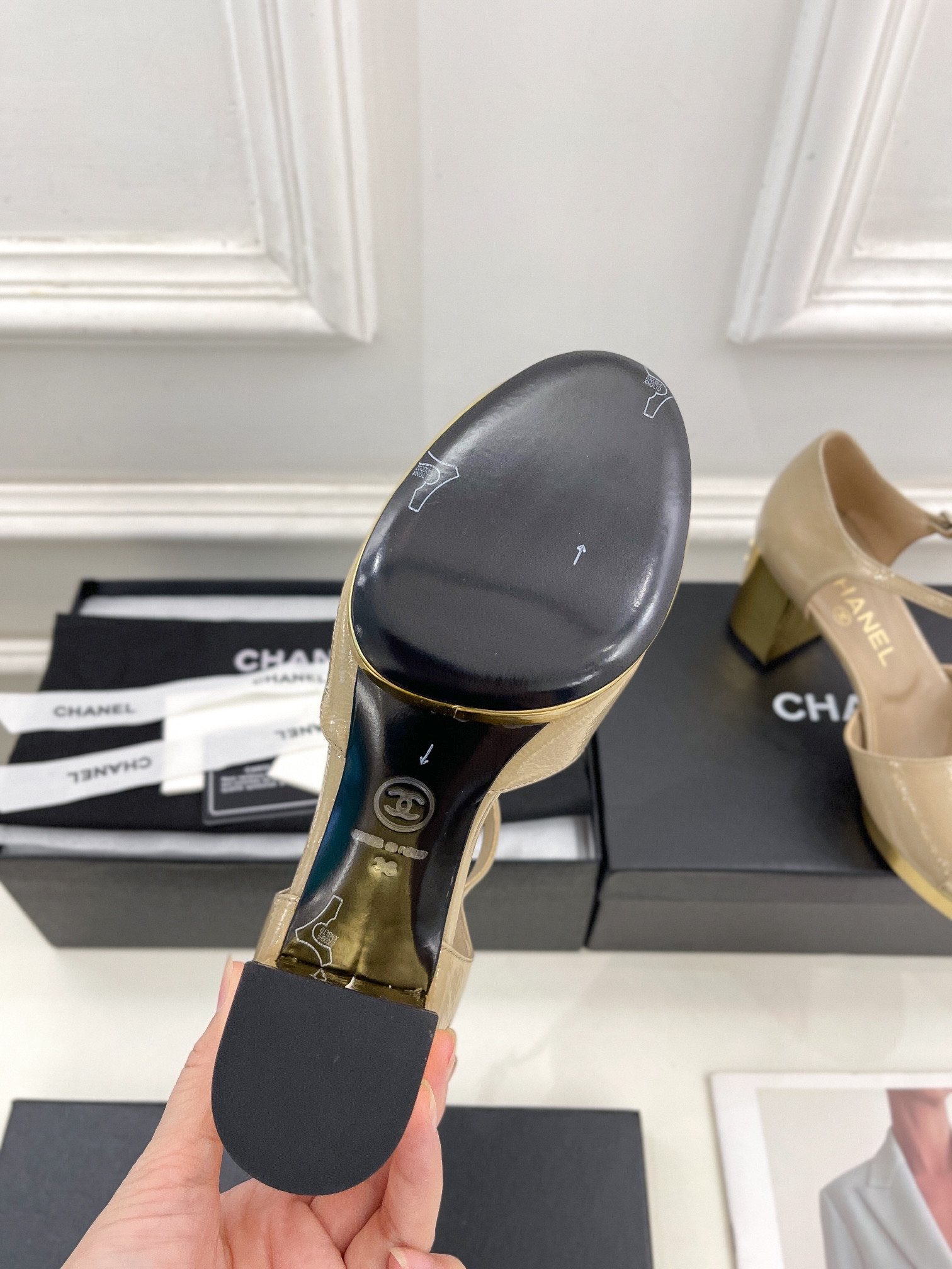 UA Ch**el HEELED SANDALS