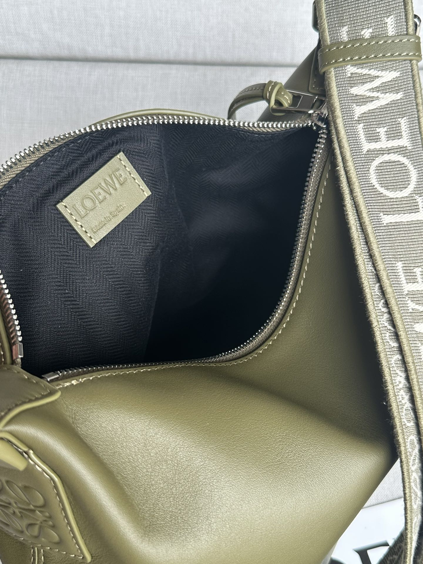 L0ew* Small Cubi crossbody bag in S*pple smooth calfskin and jacquard 29.5x10.5x22cm